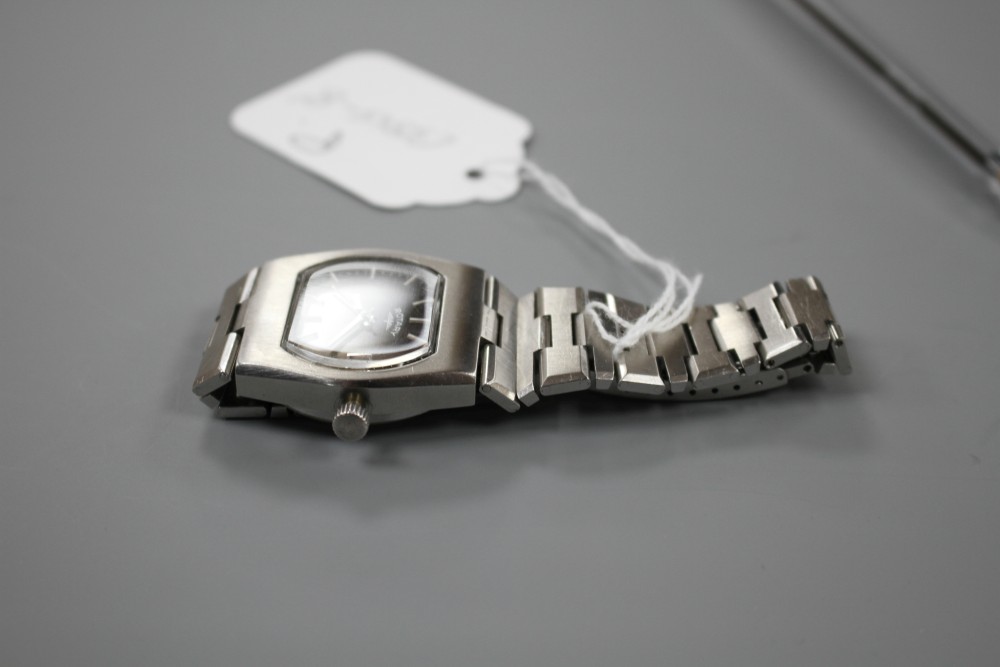 A gentlemans modern stainless steel Rotary manual wind? wrist watch, winder detached.